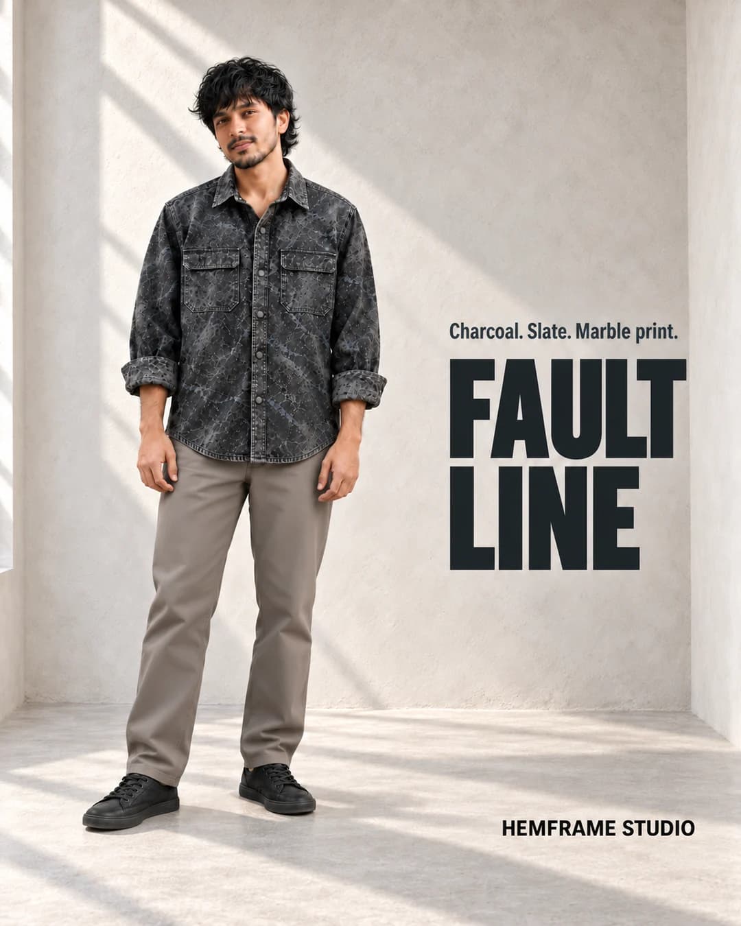 FAULT / LINE: Charcoal marble-print shirt in a pale plaster passage