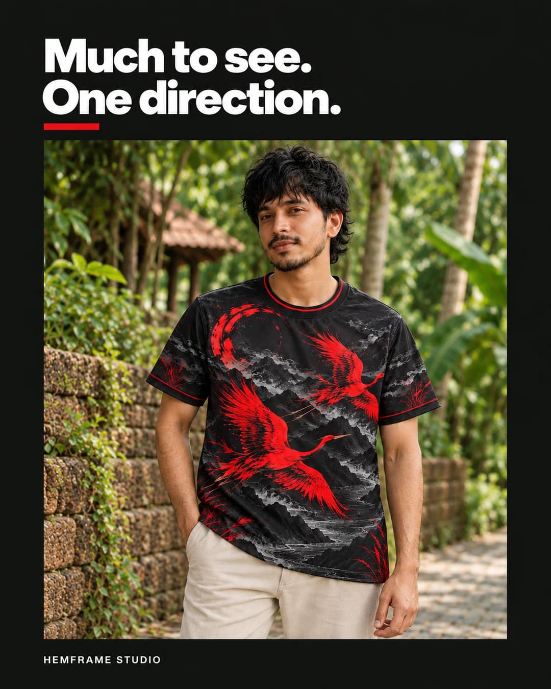 Crane-print tee styled on a shaded laterite garden path
